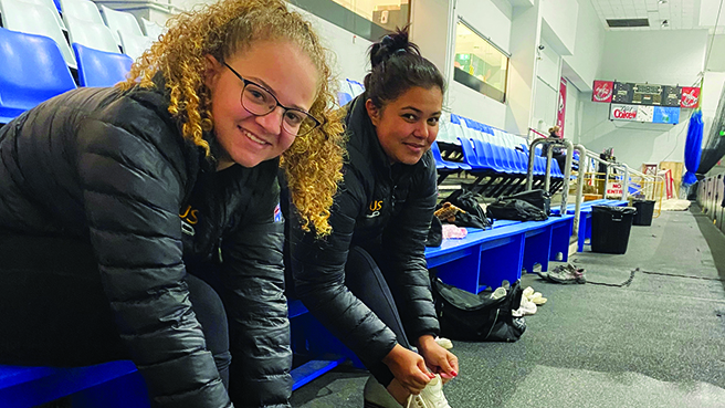 NSW Ambulance staff Amber Hawkins and Jasmin Fernando putting on their ice skates before an early morning training session