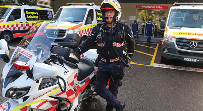 Intensive Care Paramedic Paul Smith of the NSW Ambulance Motorcycle Response Unit outside Sydney's St Vincent's Hospital