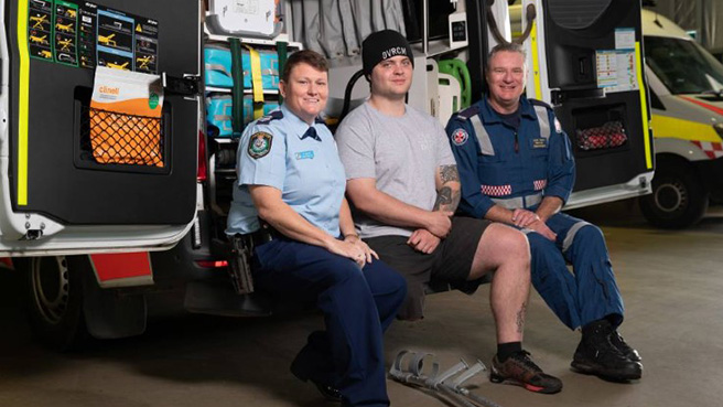 A media reunite photo run in the Wagga Wagga's Daily Advertiser featuring motorcycle crash survivor Sean Sudholz and Special Operations Team paramedic Michael Cooke.